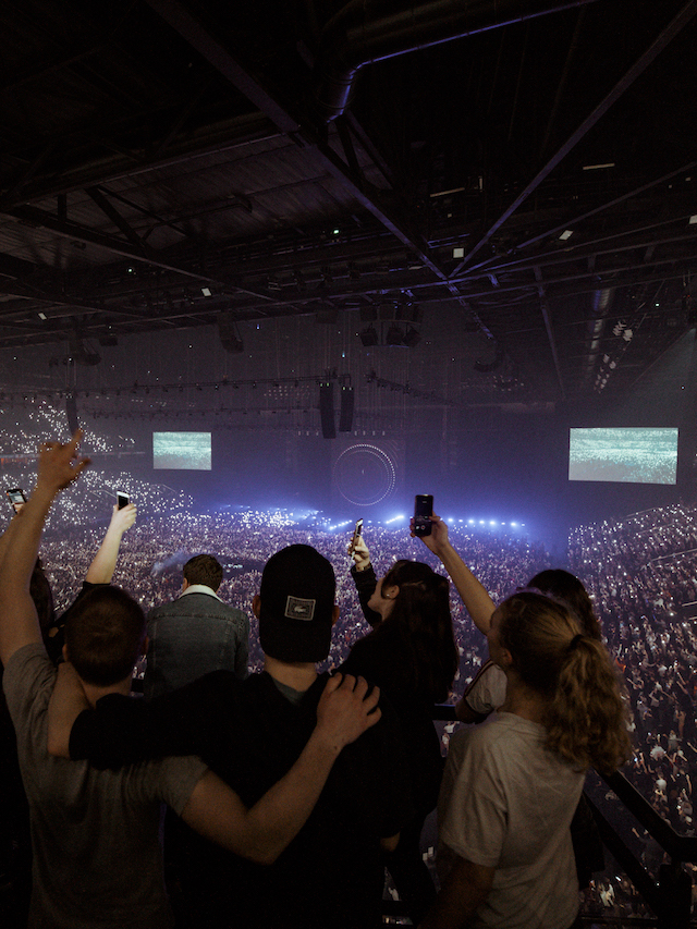Audience enjoying a concert at Paris La Défense Arena in VIP