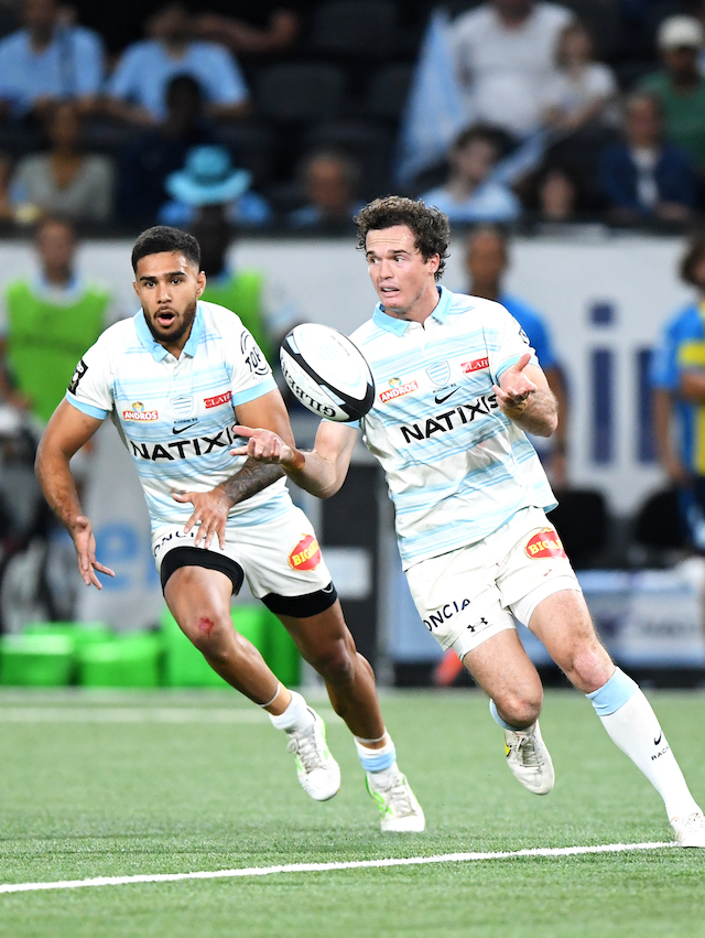 Two rugby players on the field during a Racing 92 match