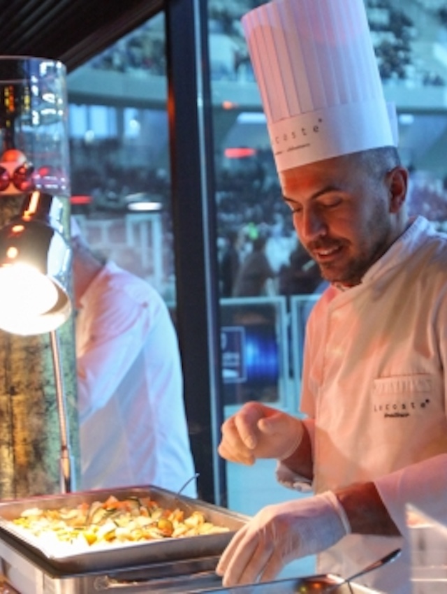 A culinary chef hosts a VIP hospitality event