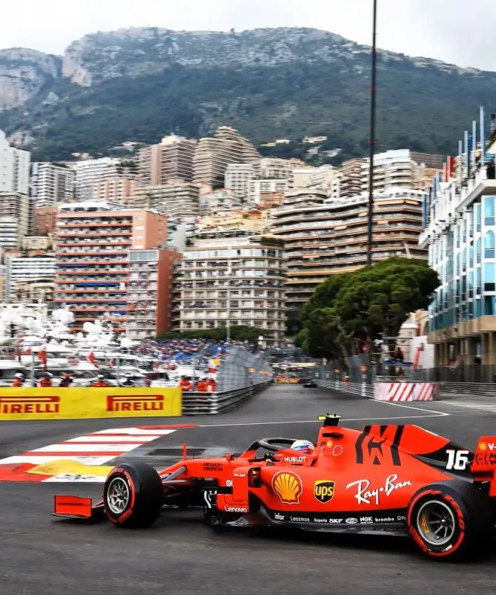 Ferrari Formula 1 car racing through Monaco street circuit with VIP hospitality packages by Sodexo Live! Hospitality