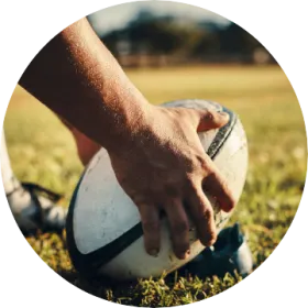 5 editions de RWC.png Joueur de rugby avec un ballon