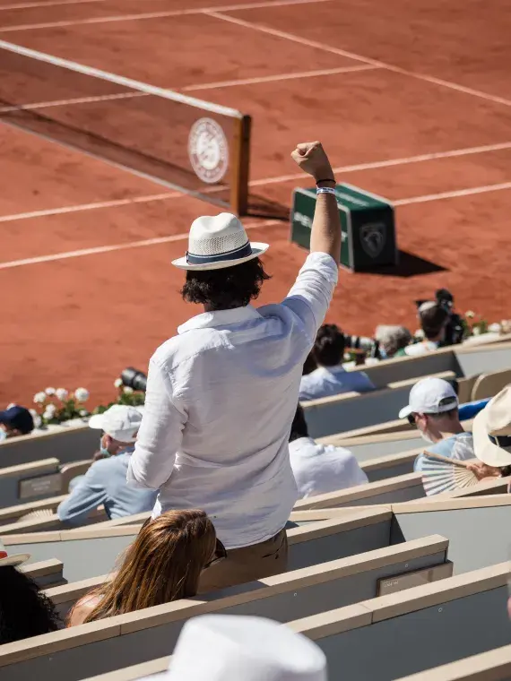VIP spectator enjoying Roland-Garros Philippe Chatrier court