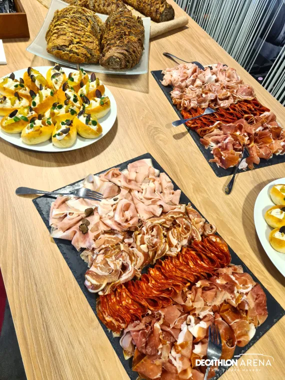 Shared Lounge offer with cocktails and a platter of assorted charcuterie