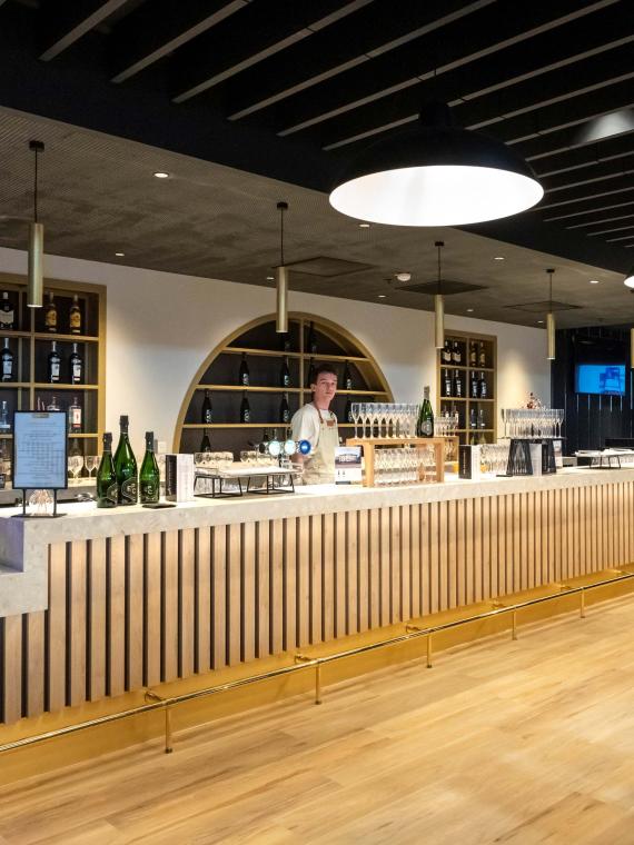 Champagne bar in the hospitality area at LDLC Arena Lyon, offering an exclusive and luxurious experience