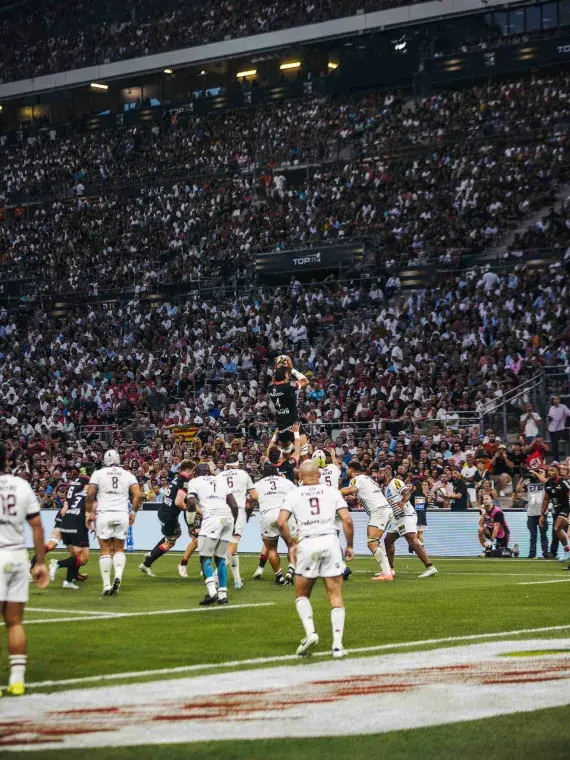 ugby action captured from a VIP suite during the Top 14 semi-final.