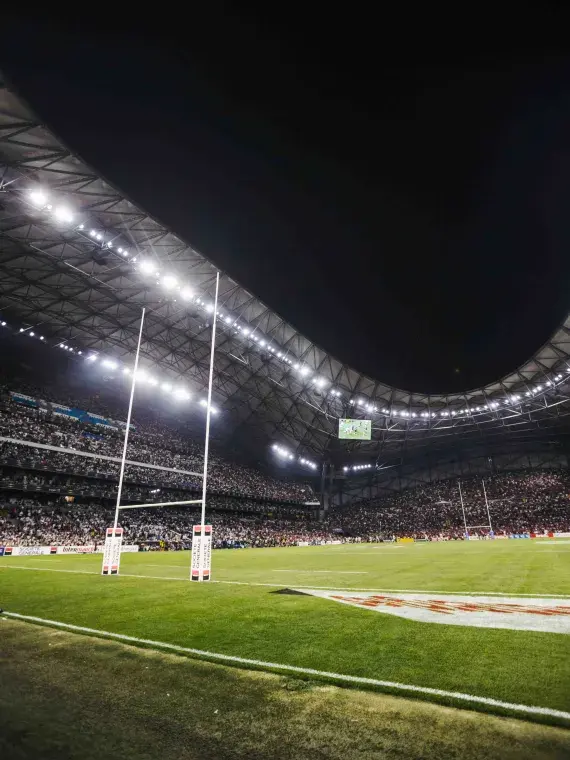 Live rugby action seen from the panoramic VIP lounge