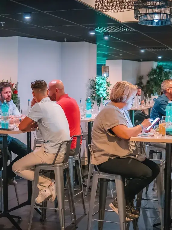 VIP guests enjoying a relaxed atmosphere at Brasserie Ganay during a rugby match