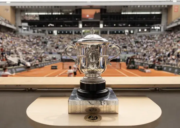 Roland-Garros women’s trophy highlighted, symbolizing the prestige associated with the VIP experiences offered by Sodexo Live! Hospitality.