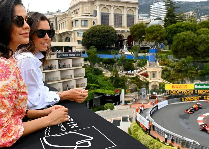 Two clients attending Monaco Grand Prix from a VIP hospitality terrace with Sodexo Live! Hospitality