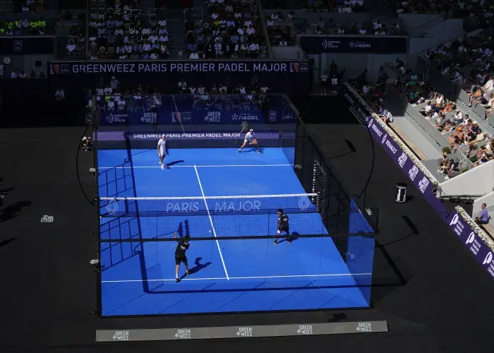 Top-down view of a padel match taking place on the court installed inside Court Philippe-Chatrier at Roland-Garros, during the Alpine Paris Major Padel 2026, as part of the Sodexo Live! Hospitality experience in Paris.